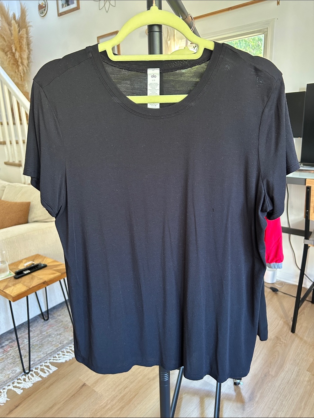 ALO Tee. Size Large. PTP 21”. Used condition. Small snag on front. See photo